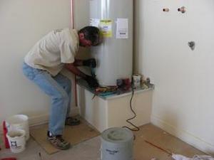 one of our Salinas water heater repair pros is installing a new unit